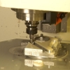 Focus engine mount being cut on our CNC machine.